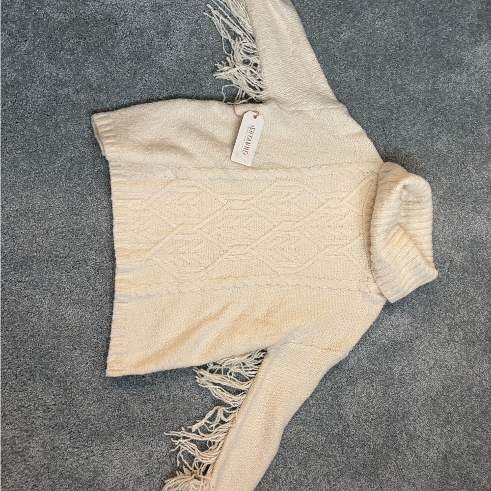 Shyanne Cream Cable-Knit Fringe Turtleneck Sweater